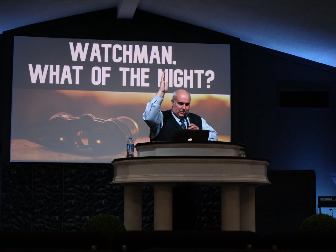 Pastor preaching during a service