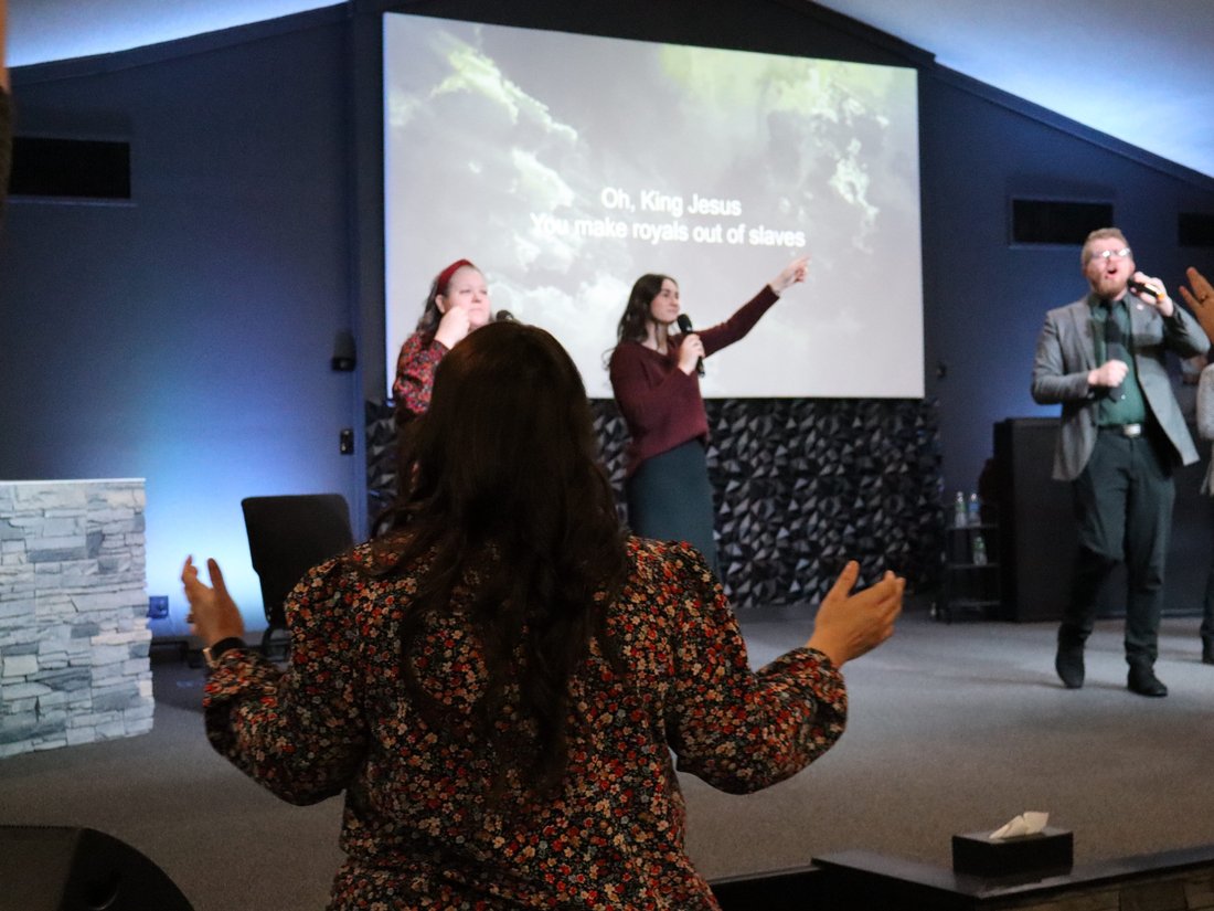 The worship team leading in song