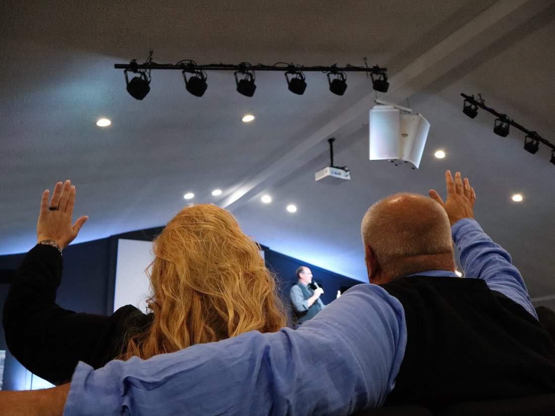 Hands raised in worship