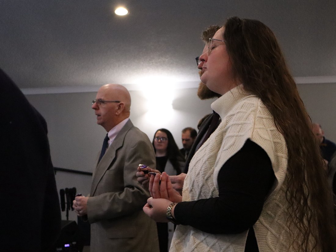 Worshipers in prayer